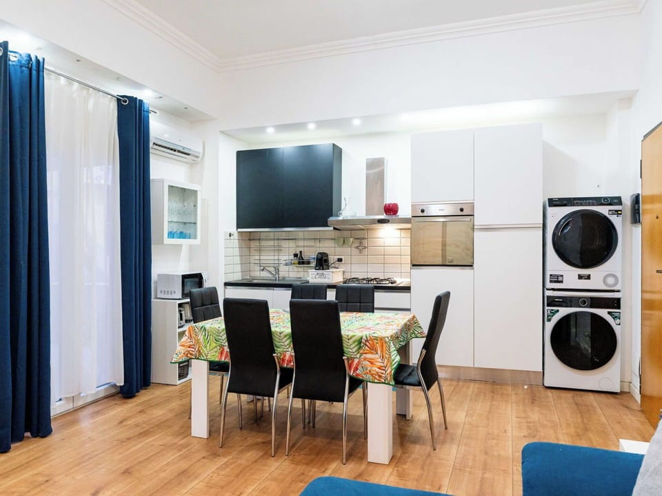 Interior Design, Flooring, Floor, Ceiling, Apartment, Shade, Chair, Light Fixture, Lamp, Houseplant