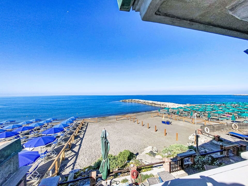Blue, Body Of Water, Sea, Coast, Coastal And Oceanic Landforms, Ocean, Beach, Resort, Vacation, Shade