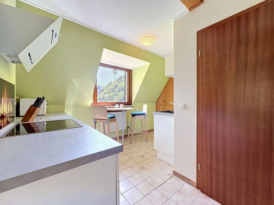 Interior Design, Flooring, Wood, Ceiling, Floor, Room, Furniture, Kitchen, Cabinetry, Attic