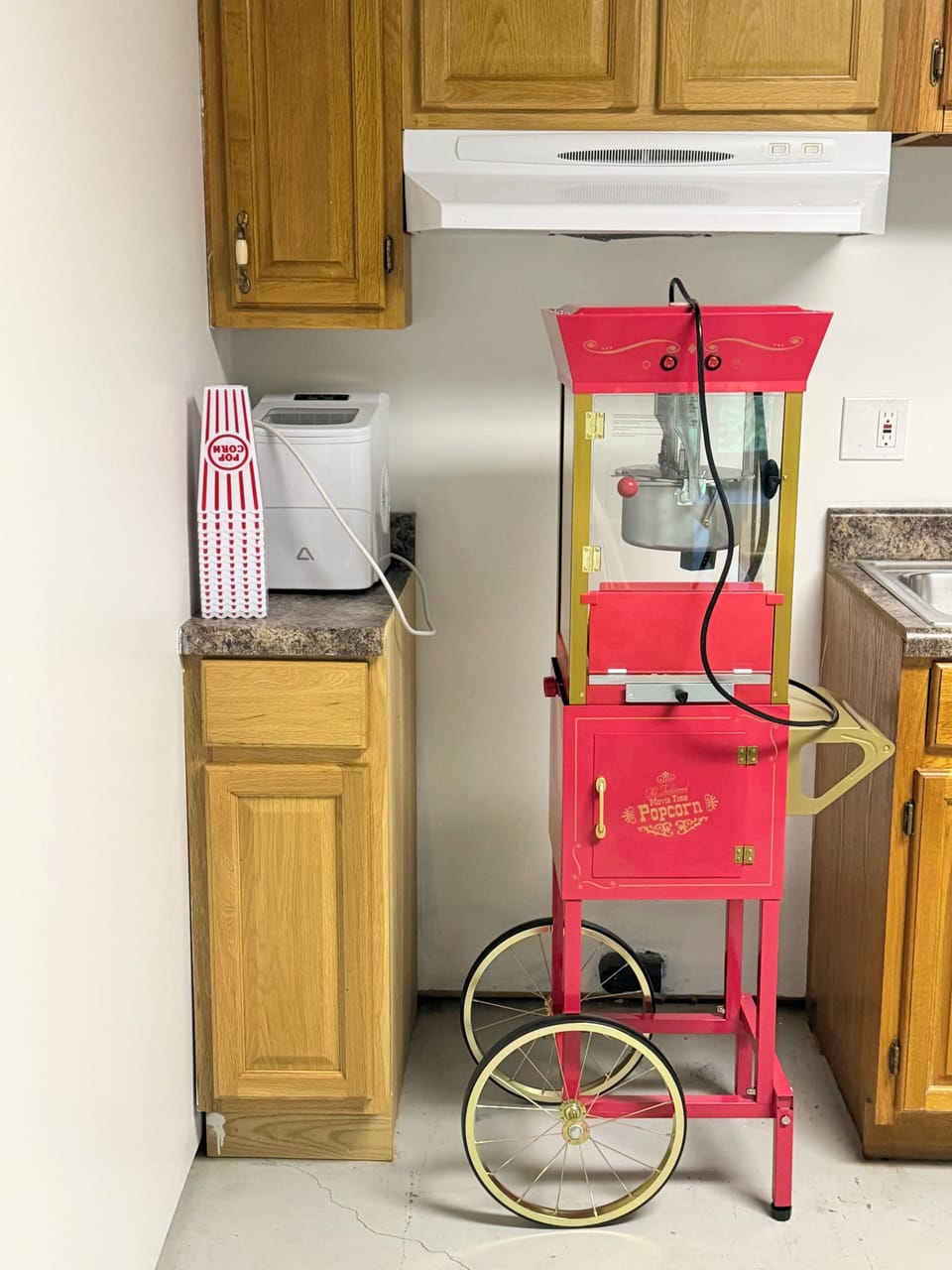Vintage popcorn machine adds a fun snack station for cozy movie nights