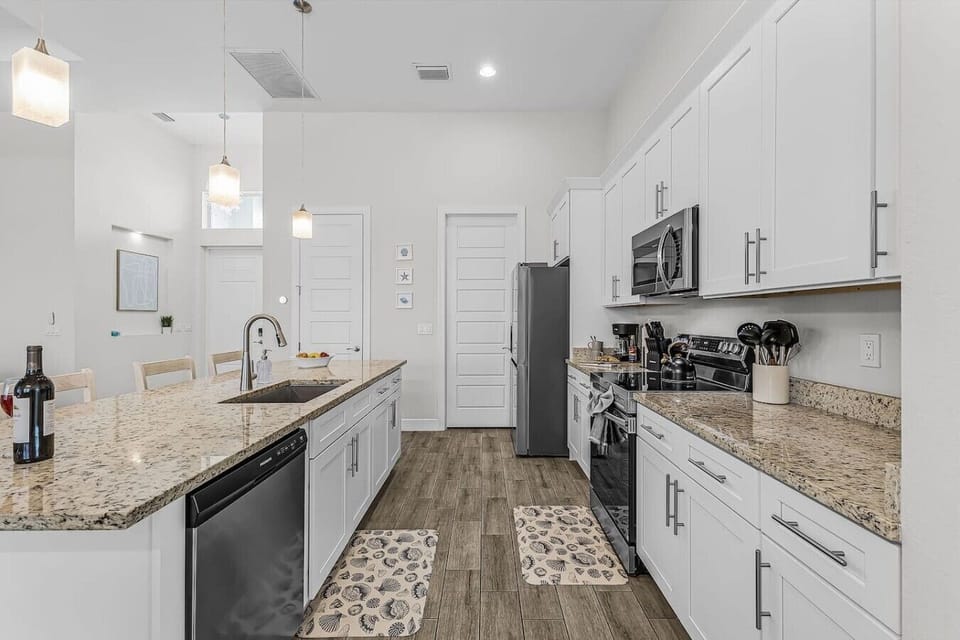 This kitchen has it all, modern appliances and super clean