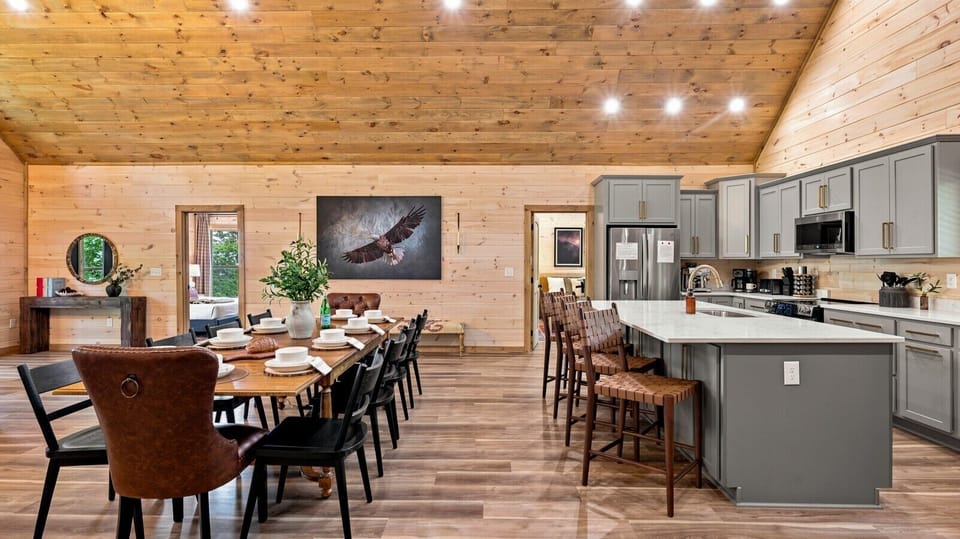 With seating at both the oversized island and large dining table, there`s plenty of space for morning coffee, shared meals, or evening conversations after a day in the Smokies.