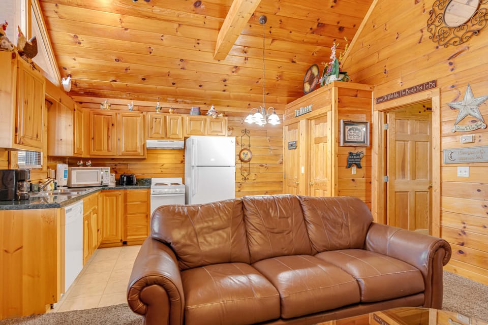 Living Room Retreat, charmingly rustic with warm wood finishes and a welcoming atmosphere!
