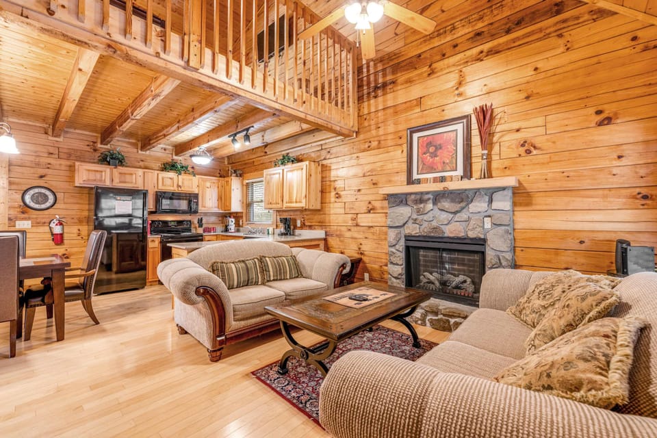 Charming wood accents and a stone fireplace create the perfect getaway vibe!