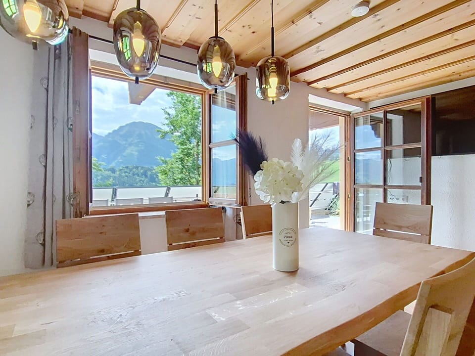 Furniture, Interior Design, Flooring, Wood, Ceiling, Light Fixture, Floor, Chandelier, Dining Room, Lighting
