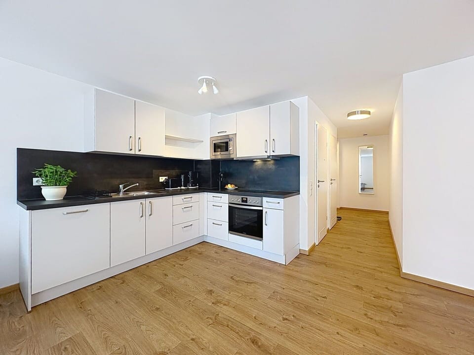 Flooring, Interior Design, Floor, Wood, Ceiling, Kitchen, Room, Wood Flooring, Countertop, Cabinetry