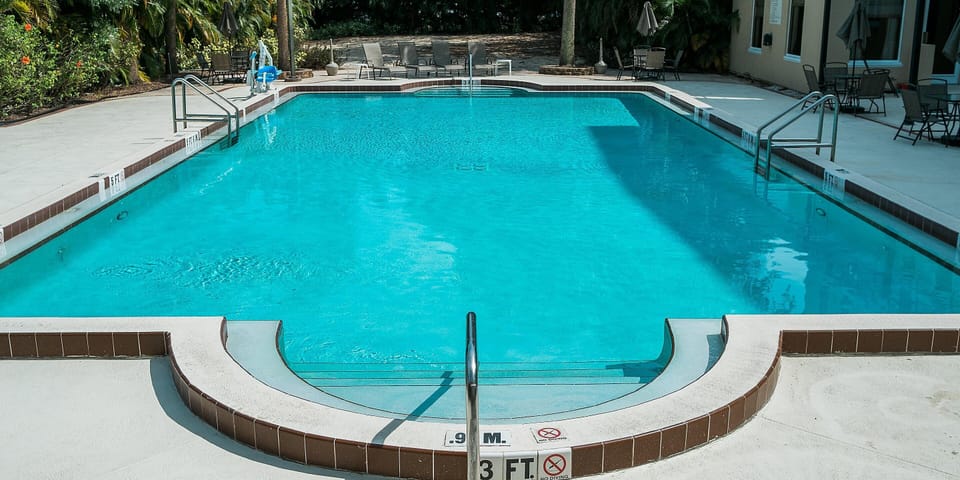 Swim laps in the clear pool with easy step entry.
