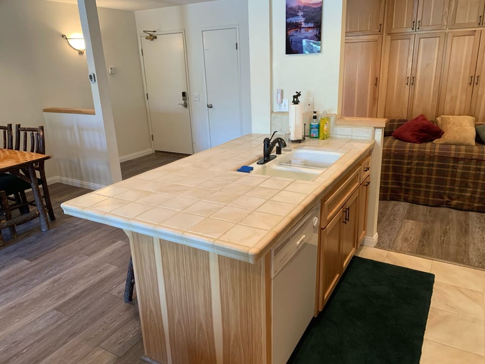 Kitchen includes microwave oven and lots of appliances. Very well stocked.