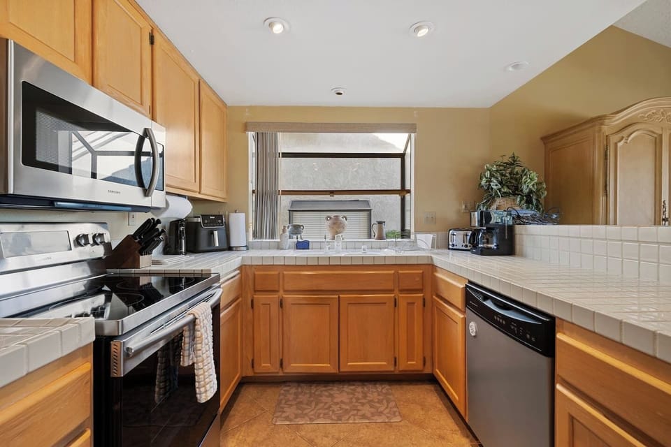 Bright, modern kitchen with stainless appliances and plenty of counter space.