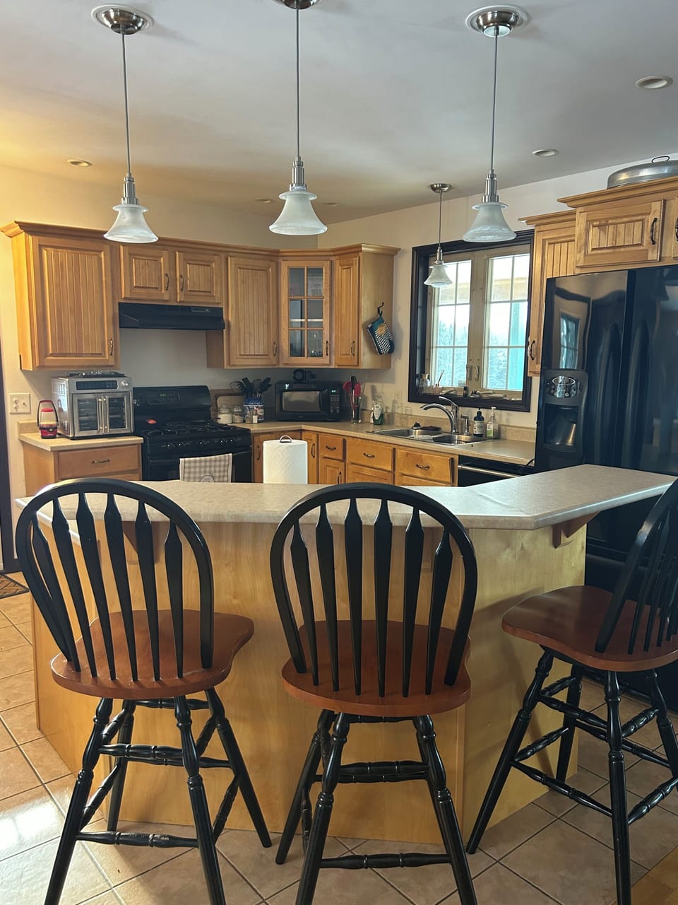 Breakfast bar with 3 chairs.