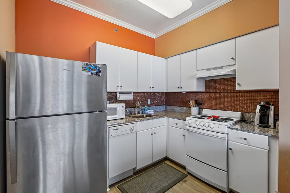 Full kitchen
Refrigerator
Dishwasher
Microwave 
Stove
Keurig