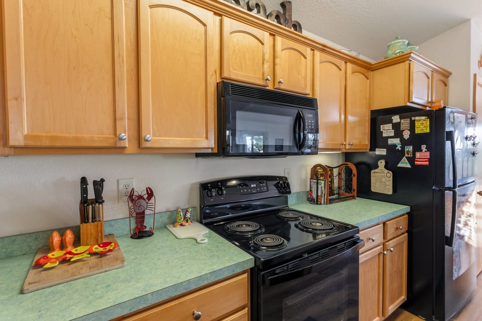 Prepare everything from quick breakfasts to family feasts in the fully equipped kitchen designed for easy vacation living.