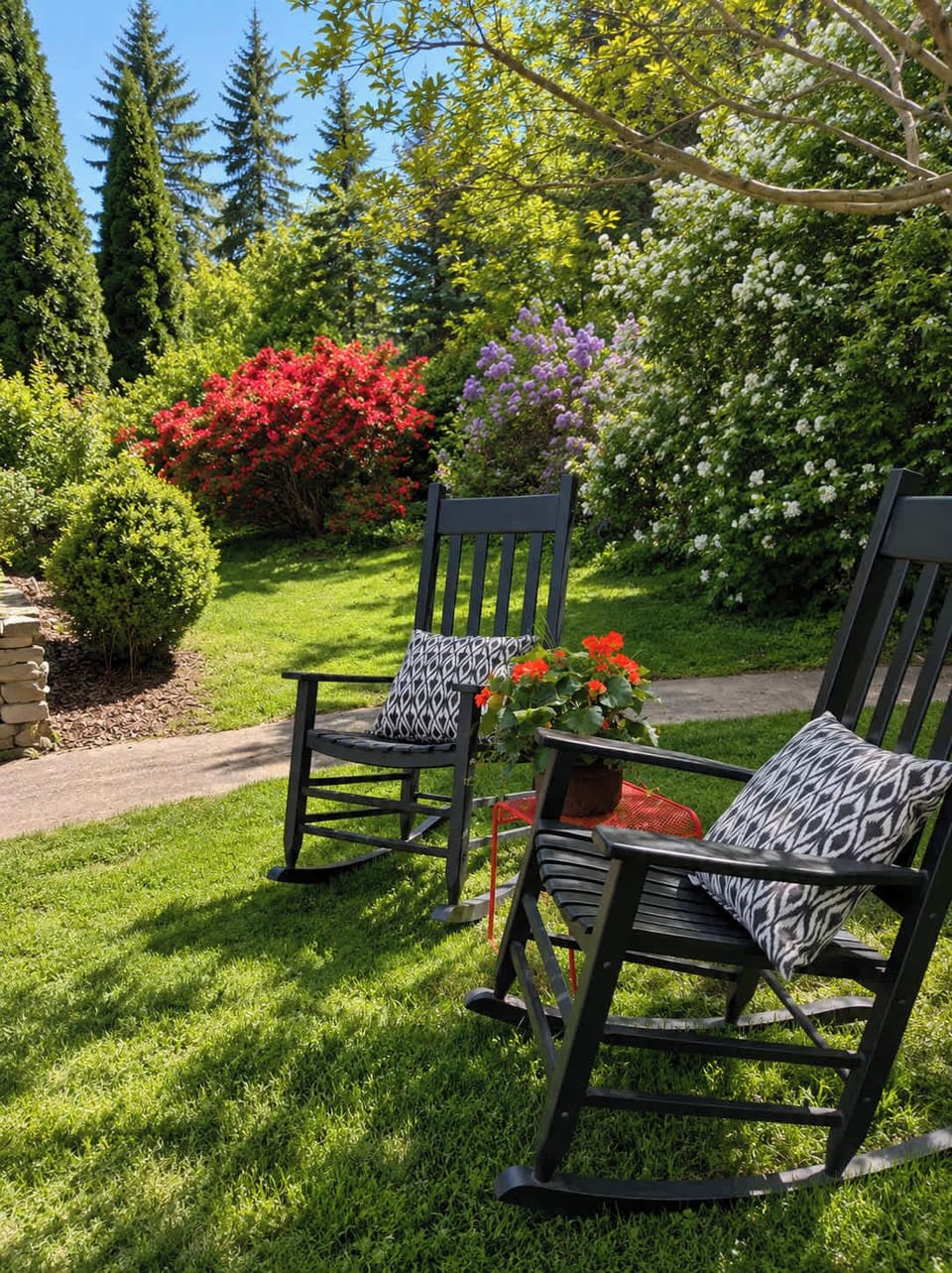 Rocking Chairs Offer the Perfect Spot to Unwind and Take in the Beauty of the Garden