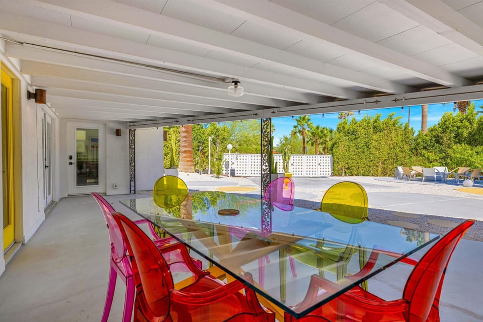 Outdoor dining space overlooking the backyard