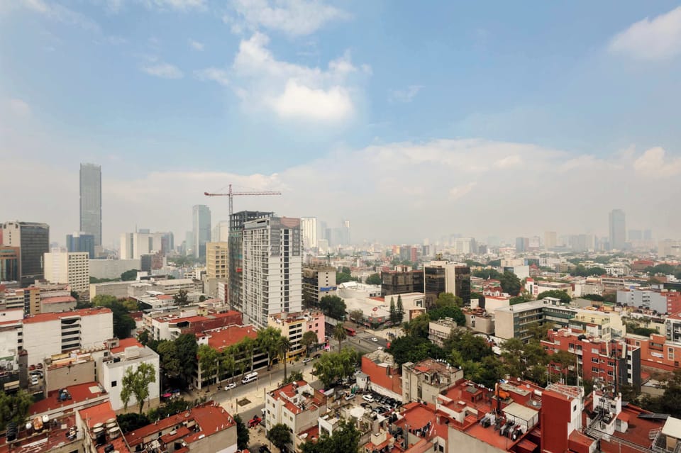 Panoramic city skyline views.