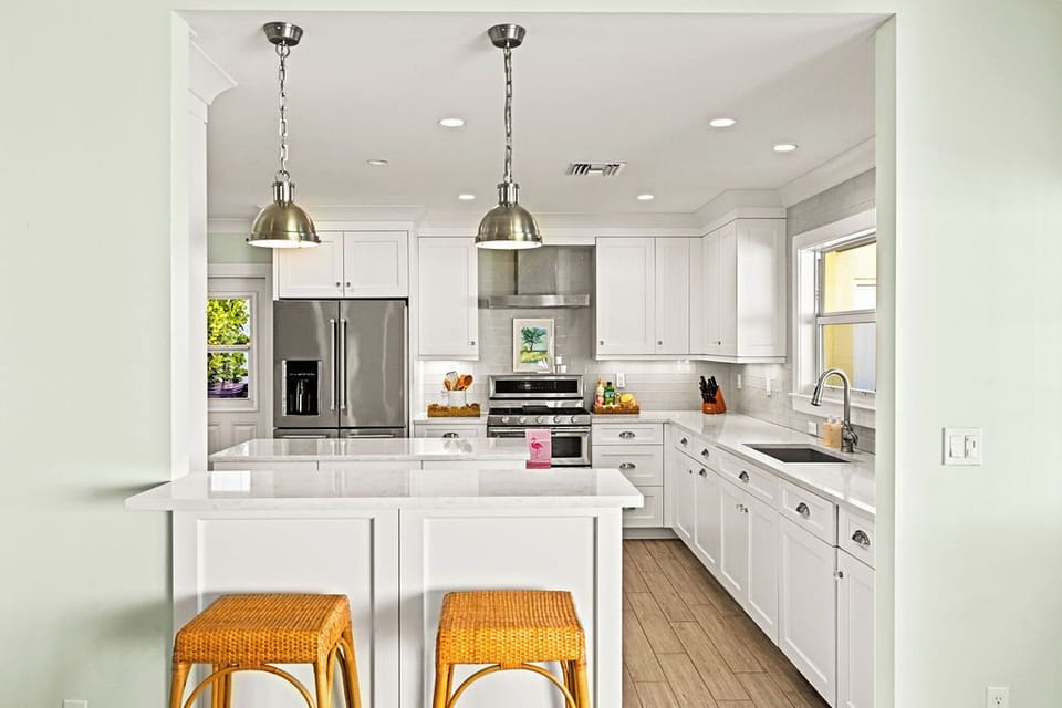 Pull up a stool! The kitchen island is the perfect spot for morning coffee or evening snacks. ☕🥐