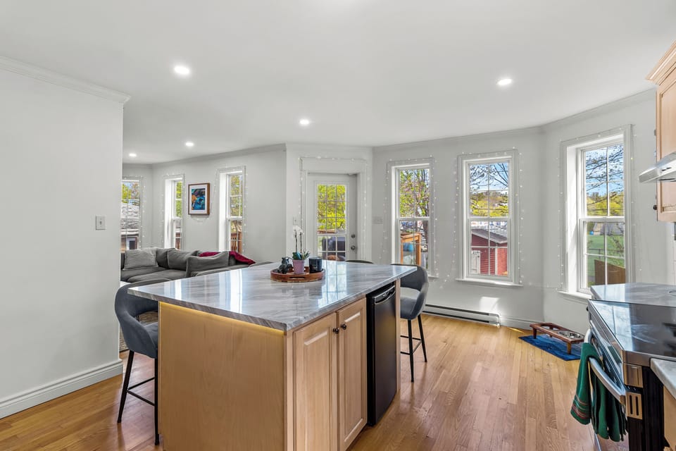 Open kitchen and dining layout ideal for gathering with family and friends