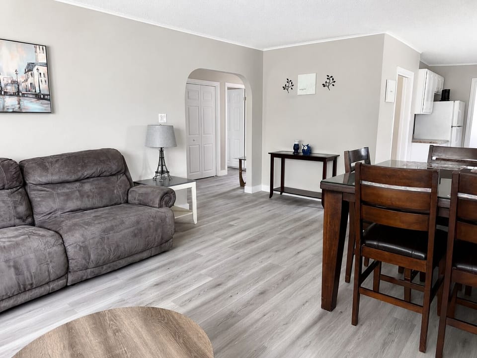 Relax in a welcoming open-concept living area designed for comfort and connection.