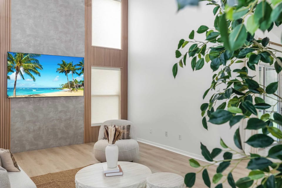 Find your calm in this beautifully styled living room, a space crafted to help you unplug and soak in the company of those who matter most. From the plush seating to the inviting atmosphere, everything is ready for your group’s most relaxing moments.