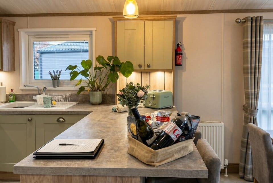 Welcome hamper and wine waiting on the kitchen island at arrival.