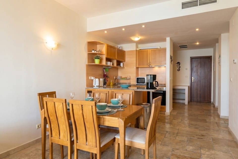 Spacious dining area flows into a full kitchen for relaxed group stays.
