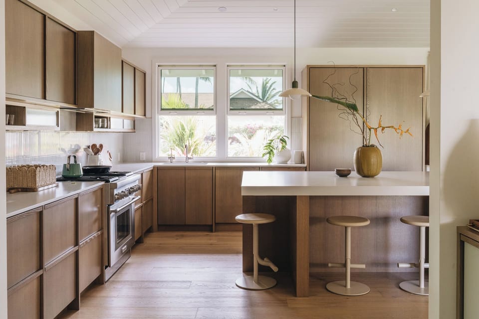 Warm finishes and modern appliances make cooking and entertaining effortless.