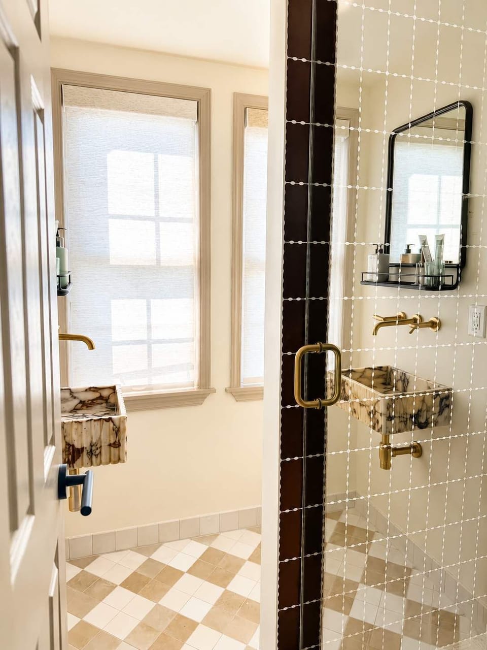 Refresh in a beautifully appointed bathroom featuring elegant finishes, premium fixtures, and a spa-inspired shower experience.
