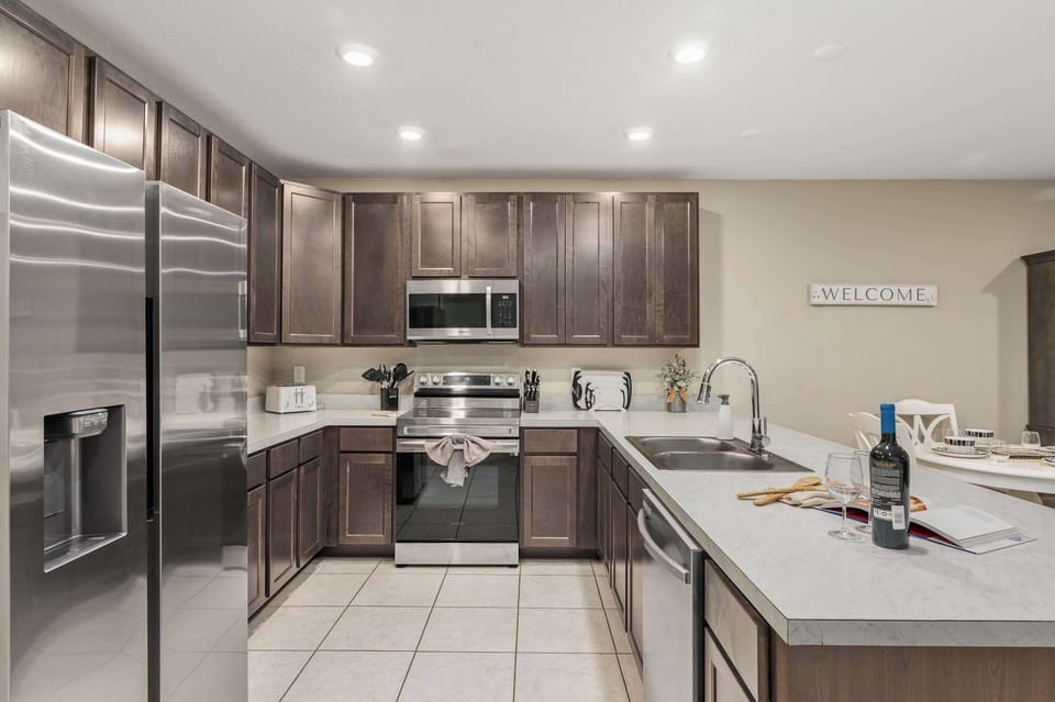 Modern kitchen with stainless steel appliances and ample cabinet space
