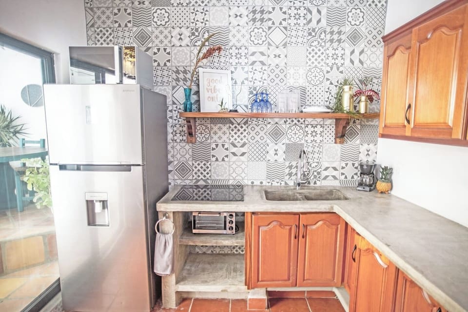 PRIVATE full kitchen- Everything needed to cook meals, including cooktop, blender, coffee maker, pots, pans, plates, cutlery, basic condiments, etc.