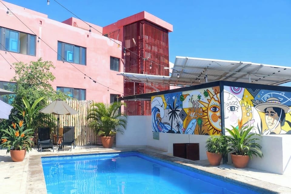 Shared rooftop pool with loungers and a nice well-priced restaurant (offsite) - FREE entrance, only order a drink or something from the menu
