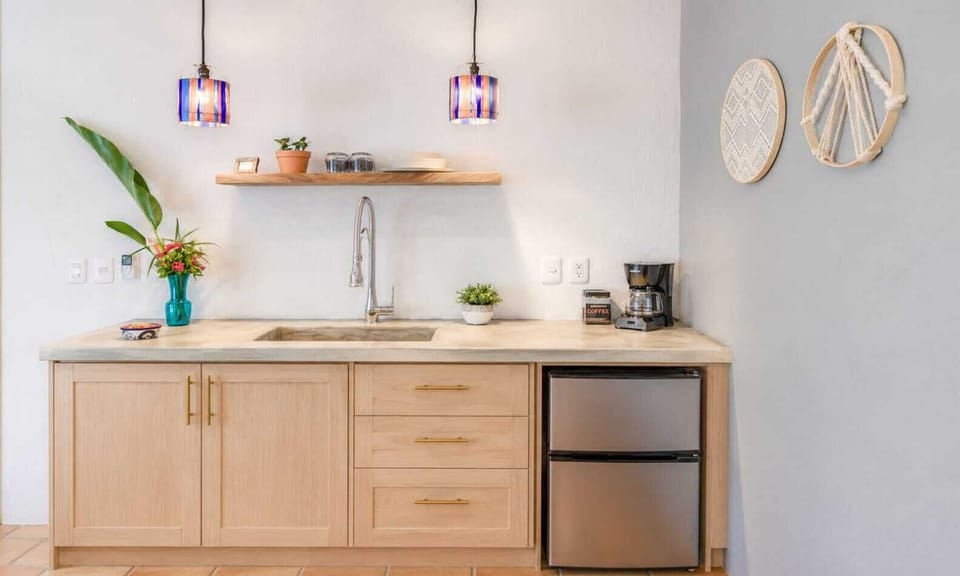 PRIVATE kitchenette - Everything needed to cook meals, including 2 burner cooktop, blender, pots, pans, plates, cutlery, basic condiments, etc.