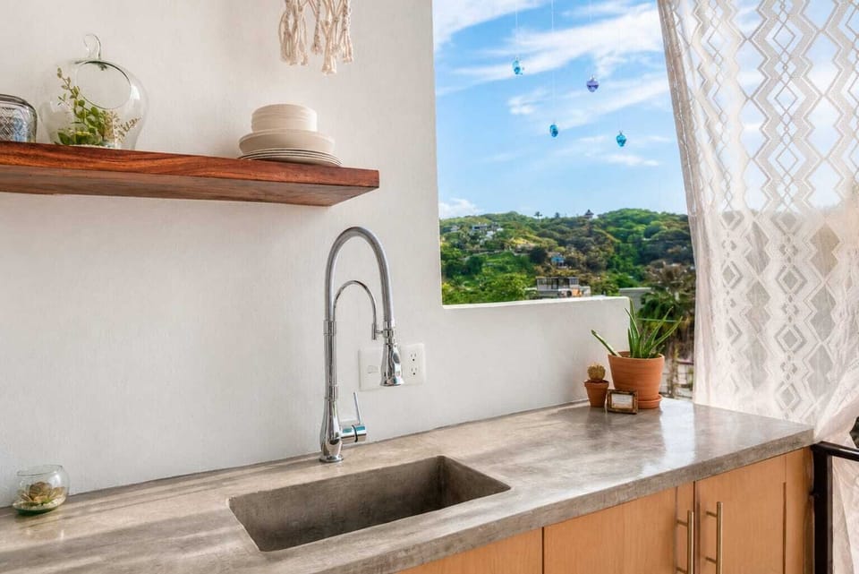 PRIVATE full kitchen- Everything needed to cook meals, including cooktop, blender, coffee maker, pots, pans, plates, cutlery, basic condiments, etc.