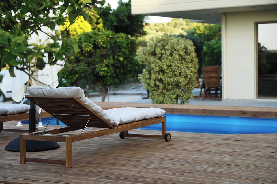 Poolside sun lounger for relaxing under the Cretan sun.