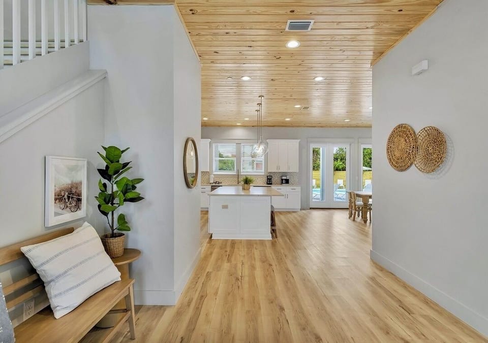 1st Floor - Welcome to Poseidon’s Palace. This grand foyer sets the tone for your luxury beach getaway, offering a bright and inviting entrance with easy access to the home’s spacious living areas and resort-style amenities.