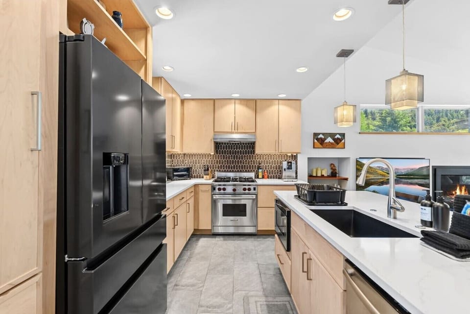 Fully equipped kitchen with island and bar seating
