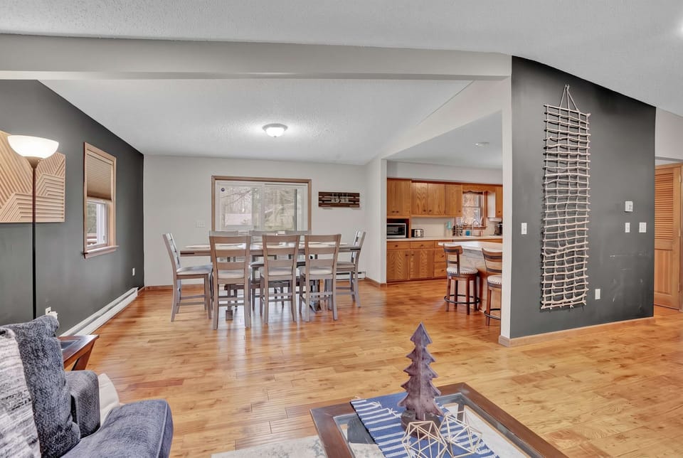 Dining room flows right into the living area, so no one's ever too far from the conversation.