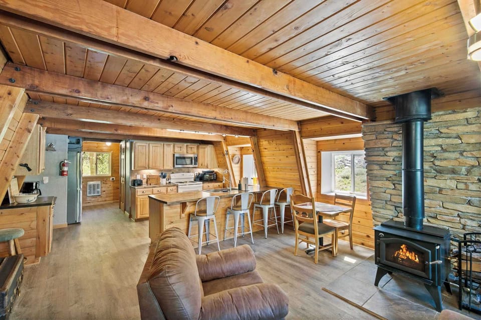 From fireside evenings to kitchen mornings at the breakfast bar — every corner of this cabin invites you to slow down and stay awhile.