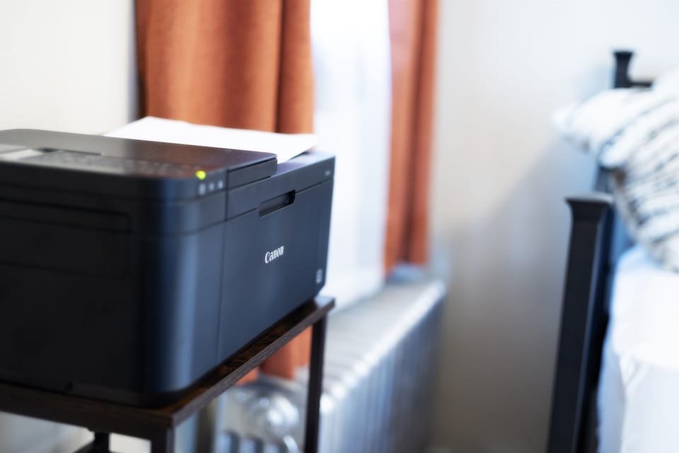 Office Ready: Efficient Workspace with Printer for All Your Professional Needs.