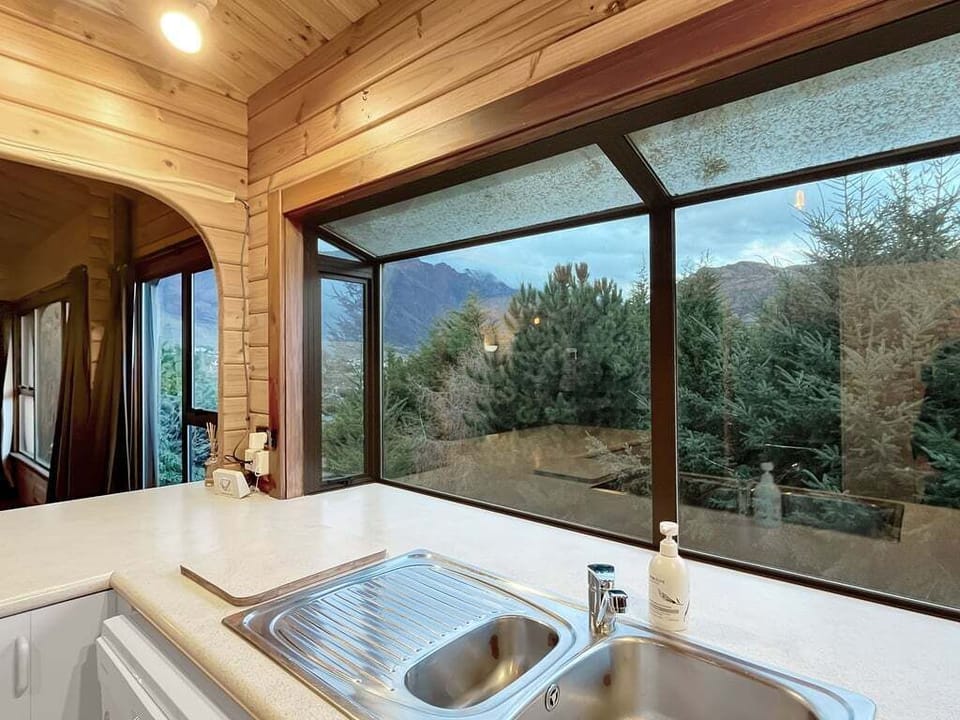 Kitchen with breathtaking forest outlook