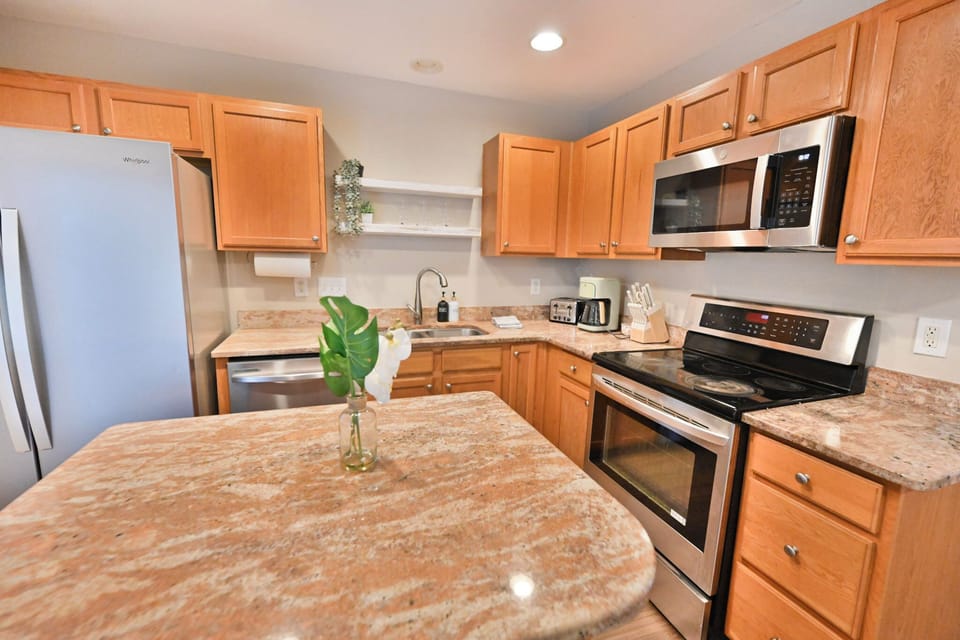 Modern kitchen featuring ample cabinet space and modern appliances.