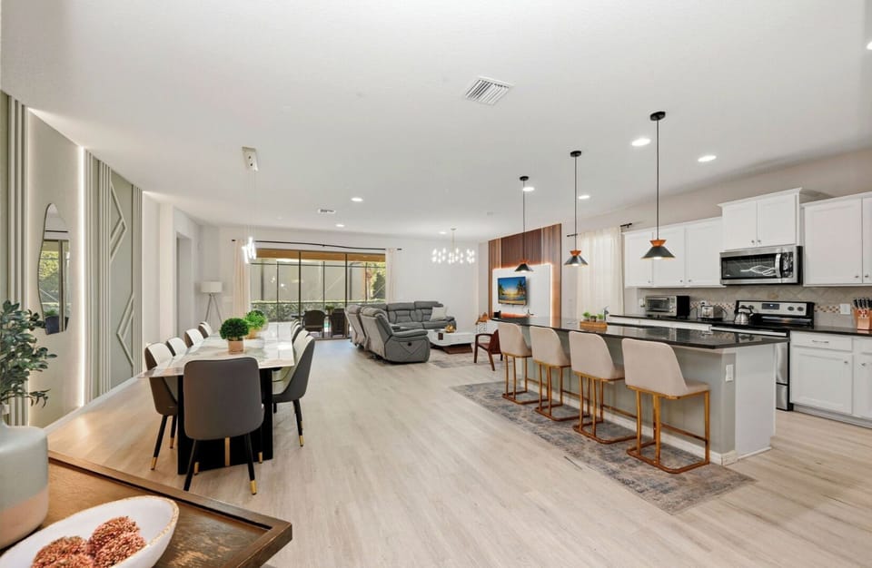 Spacious Living Area: Bright and modern with stylish decor and seamless indoor-outdoor flow!