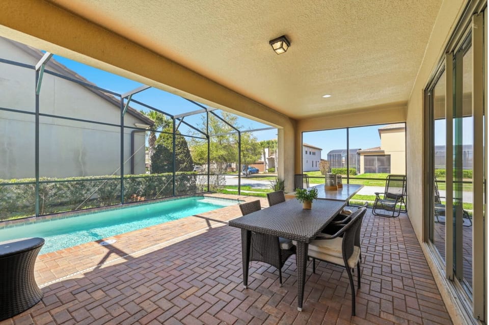 Outdoor Oasis: Dive into relaxation beside your private pool and shady lanai—perfect for sunny afternoons!
