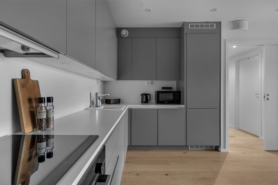 Equipment you can find in the kitchen are stovetop, oven, combined fridge and freezer, microwave, toaster, kettle, coffee machine and dishes and cooking utensils