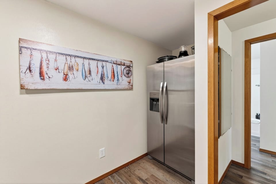 Compact kitchen stocked for simple meals during your Whidbey Island stay.