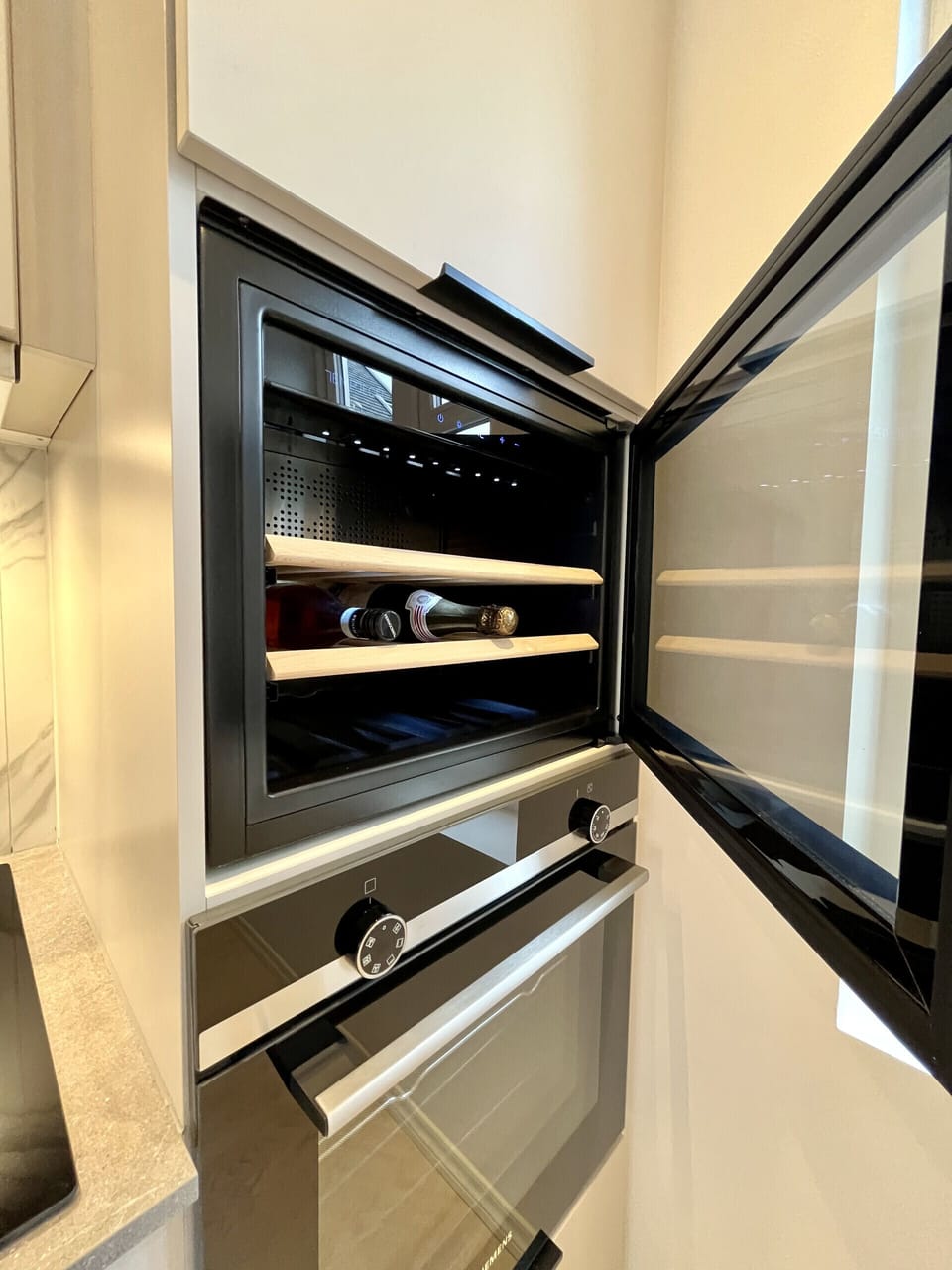 In the kitchen we have a wine cooler!