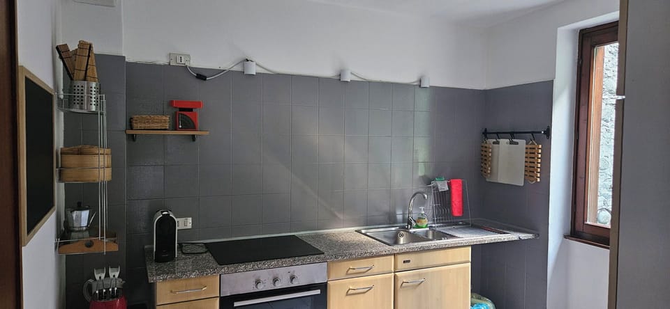 Kitchen, Flooring, Interior Design, Kitchen Appliance, Furniture, Major Appliance, Floor, Countertop, Room, Kitchen Sink