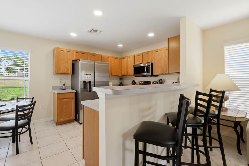 Breakfast bar seating keeps everyone connected.