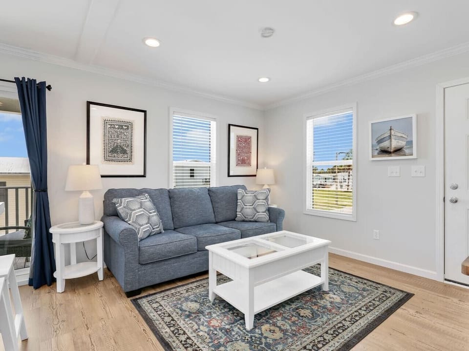 After a day of sunshine and sandy toes, unwind with a movie or simply enjoy a quiet evening in this comfortable gathering space.