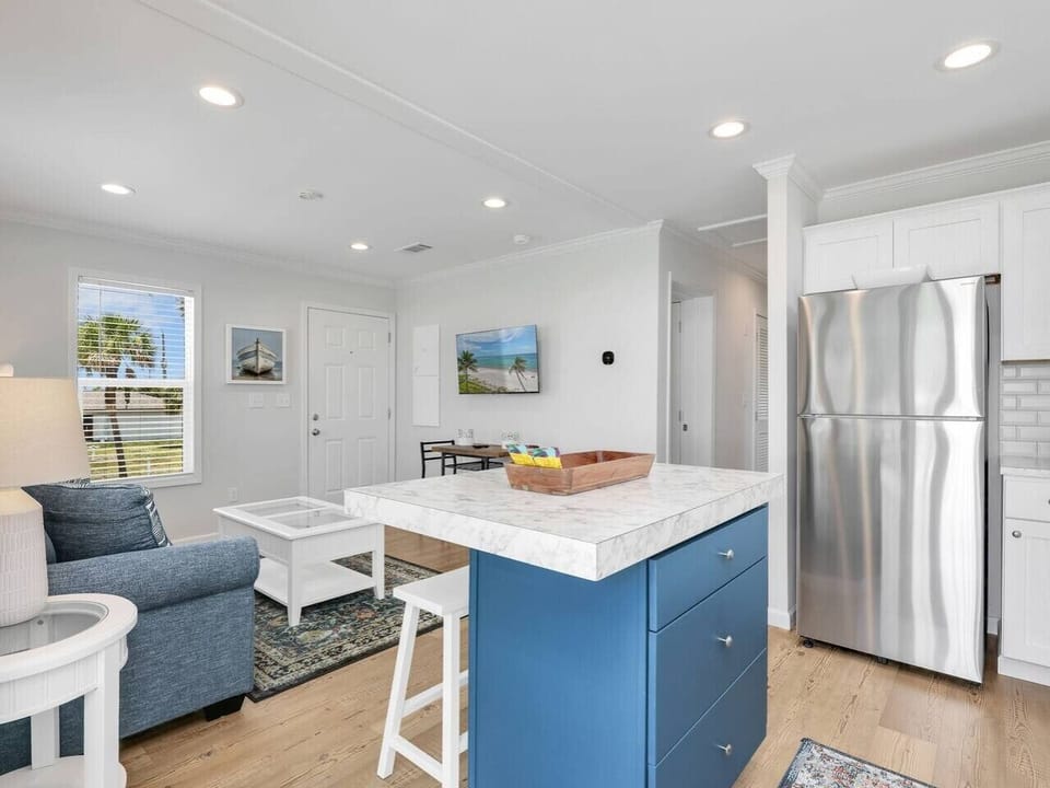 Gather around the spacious island for coffee, conversation, and planning your next beach adventure.