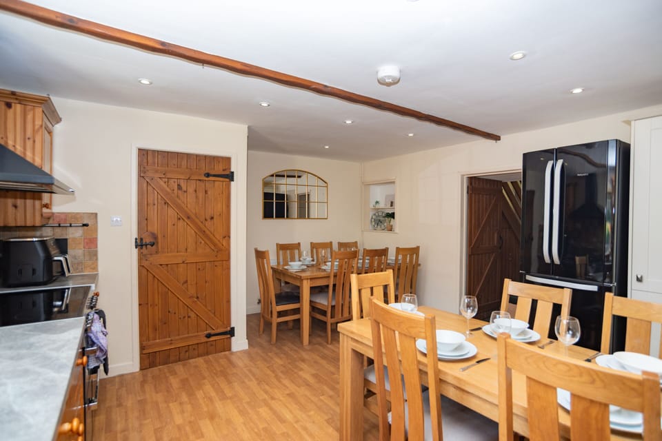 Enjoy meals together around the generous dining table - a comfortable, sociable space for families and groups.